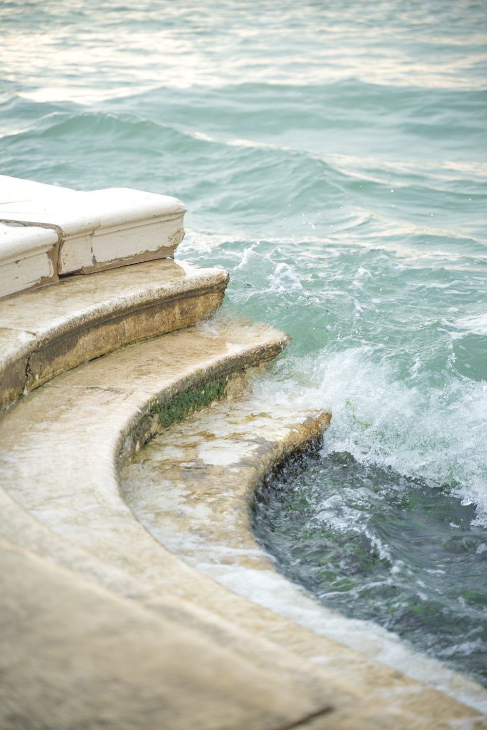 Waves crashing on steps